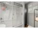 Well-maintained bathroom with a shower-tub combo and window at 2170 Midland Park Rd, North Charleston, SC 29406