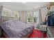 Bright bedroom with multiple windows and a comfortable bed at 2170 Midland Park Rd, North Charleston, SC 29406