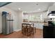 Charming kitchen featuring stainless steel appliances and a wooden dining table at 2170 Midland Park Rd, North Charleston, SC 29406