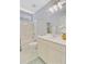Bright bathroom featuring a shower and tub combination, decorative mirror, and updated vanity at 2404 Fulford Ct, Mount Pleasant, SC 29466
