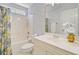 This bathroom features a tub-shower combo, a single sink vanity, and stylish decorations for a refreshing space at 2404 Fulford Ct, Mount Pleasant, SC 29466