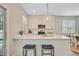 Open kitchen featuring a breakfast bar, white cabinets, stainless steel appliances and recessed lighting at 2404 Fulford Ct, Mount Pleasant, SC 29466