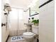 Bright bathroom features traditional style, tub-shower combo, and crisp white and black accents at 31 Lyttleton Ave, Charleston, SC 29407