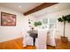 Dining room with hardwood floors, natural light, and stylish decor at 31 Lyttleton Ave, Charleston, SC 29407