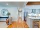 Spacious living room that connects to modern kitchen, features hardwood floors, and open concept at 31 Lyttleton Ave, Charleston, SC 29407