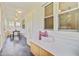 Inviting sunroom with built-in bench seating, storage, and serene natural light at 316 Simmons Ave, Summerville, SC 29483