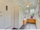 Bright sunroom featuring natural light, built-in seating, and ample storage at 316 Simmons Ave, Summerville, SC 29483