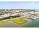 Breathtaking aerial view of the cityscape with waterfront views and lush greenery at 32 Prioleau St # J, Charleston, SC 29401
