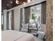 Relax in this bedroom with lots of natural light, comfortable seating and stylish accents at 32 Prioleau St # J, Charleston, SC 29401