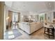 Bright living room featuring a fireplace, natural light, and an open concept, perfect for entertaining at 32 Prioleau St # J, Charleston, SC 29401