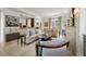 An expansive living room featuring a large sectional sofa and stone fireplace at 32 Prioleau St # J, Charleston, SC 29401
