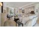 Bright living room featuring an open layout with modern finishes, comfortable seating, and natural light at 32 Prioleau St # J, Charleston, SC 29401