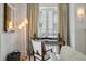 Comfortable office with a well-lit desk, modern chair, neutral decor, and bright natural light at 32 Prioleau St # J, Charleston, SC 29401