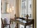 Stylish home office with elegant desk, comfortable chair, and decorative accents, perfect for work or study at 32 Prioleau St # J, Charleston, SC 29401
