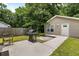 Backyard with a patio, grill, and fenced area, perfect for outdoor living and entertaining at 3347 Walter Drive, Johns Island, SC 29455