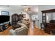 Inviting living room with hardwood floors, comfortable seating, and an open layout into the kitchen area at 3347 Walter Drive, Johns Island, SC 29455