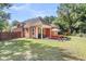 Expansive backyard featuring a covered patio with dining area, perfect for outdoor entertaining at 350 Cypress Walk Way, Wando, SC 29492