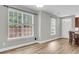 Bright living area with lots of natural light and luxury vinyl plank floors at 350 Cypress Walk Way, Wando, SC 29492