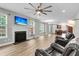 Spacious living room featuring a fireplace and open access to kitchen at 350 Cypress Walk Way, Wando, SC 29492
