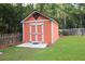 Outdoor shed with a small patio and a 'Love Shack' sign on it at 350 Cypress Walk Way, Wando, SC 29492