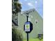 Nelliefield HOA neighborhood street sign at corner of Cypress Walk Way and Nelliefield Creek Dr at 350 Cypress Walk Way, Wando, SC 29492