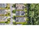 Aerial view of multiple homes showing roof lines, tree coverage, and surrounding landscape at 3537 Crosstrees Ln, Mount Pleasant, SC 29466