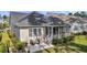 Charming backyard featuring a covered porch, patio, and well-maintained landscaping for outdoor enjoyment at 3537 Crosstrees Ln, Mount Pleasant, SC 29466