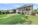 Spacious backyard featuring a screened porch, perfect for outdoor relaxation and entertaining at 3537 Crosstrees Ln, Mount Pleasant, SC 29466