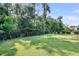 Expansive grassy backyard offering plenty of space for activities and relaxation at 3537 Crosstrees Ln, Mount Pleasant, SC 29466