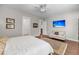 Main bedroom with a beach view on TV, neutral color scheme and hardwood floors at 3537 Crosstrees Ln, Mount Pleasant, SC 29466
