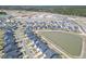 Aerial view of community with ponds and new home construction at 444 Parish Farms Dr, Summerville, SC 29486