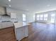Kitchen featuring an island, stainless steel appliances, and an open floor plan at 444 Parish Farms Dr, Summerville, SC 29486