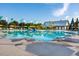 Sparkling swimming pool with lounge chairs and umbrellas for a resort-style living experience at 444 Parish Farms Dr, Summerville, SC 29486
