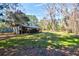 Rustic barn with ample covered storage space and access to the yard at 4715 Highway 165, Meggett, SC 29449