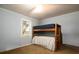This carpeted bedroom features light filled windows and built-in bunkbeds at 4715 Highway 165, Meggett, SC 29449