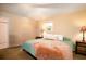 Cozy bedroom with plush bedding, side tables, and soft lighting, offering a comfortable retreat at 4715 Highway 165, Meggett, SC 29449