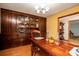 Dining room with a built-in cabinet and classic chandelier, perfect for entertaining and elegant dining at 4715 Highway 165, Meggett, SC 29449