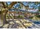Charming brick home with meticulous landscaping and inviting front entrance at 4715 Highway 165, Meggett, SC 29449