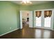 Bedroom with french doors that lead to another room and hardwood floors at 5008 Northfield Ct, Charleston, SC 29414
