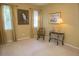 Light-filled bedroom with soft curtains, decorative art, and neutral walls and flooring at 5008 Northfield Ct, Charleston, SC 29414