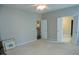 Neutral bedroom with doors leading to other rooms and carpet flooring at 5008 Northfield Ct, Charleston, SC 29414