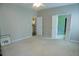 Neutral bedroom with doors leading to other rooms and carpet flooring at 5008 Northfield Ct, Charleston, SC 29414