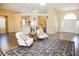 Spacious living room featuring hardwood floors, a decorative rug, and elegant furniture at 5008 Northfield Ct, Charleston, SC 29414