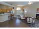 Spacious living room featuring hardwood floors and open concept to the kitchen at 5008 Northfield Ct, Charleston, SC 29414