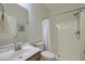 Bathroom featuring a tile shower with a curtain, white vanity, and neutral paint at 5011 W Liberty Meadows Dr, Summerville, SC 29485