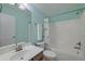 Bright, full bathroom features a shower-tub combo, single sink vanity and blue painted walls at 5011 W Liberty Meadows Dr, Summerville, SC 29485