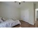 Bedroom featuring hardwood floors, a twin bed, double door closet and natural light at 5011 W Liberty Meadows Dr, Summerville, SC 29485