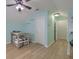 Attic bonus room with dormer shelving, ceiling fan, and ample storage in this charming home at 5011 W Liberty Meadows Dr, Summerville, SC 29485