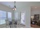 Bright breakfast nook with backyard access is perfect for casual dining at 5011 W Liberty Meadows Dr, Summerville, SC 29485