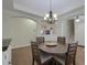 Dining room with hardwood floors, trey ceiling and decorative lighting with stair access at 5011 W Liberty Meadows Dr, Summerville, SC 29485